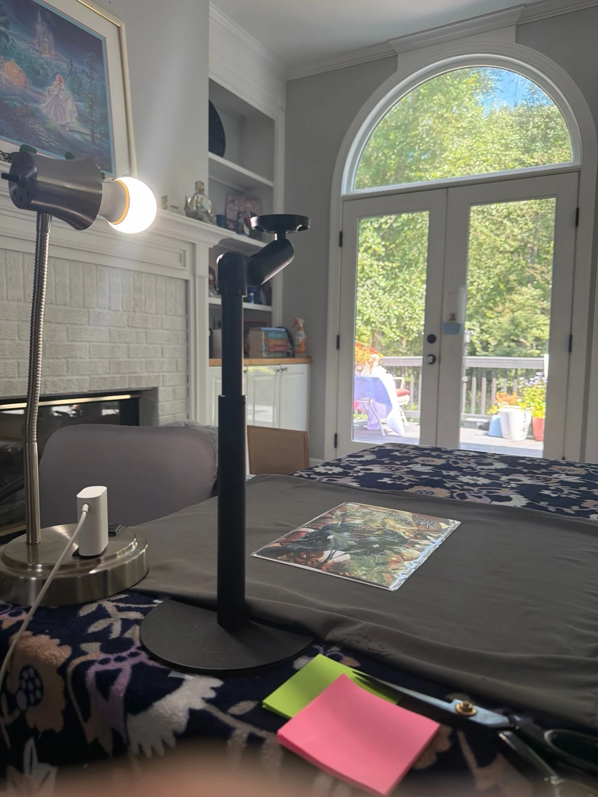 The real Keyframe Co overhead comic inspection and packing setup
